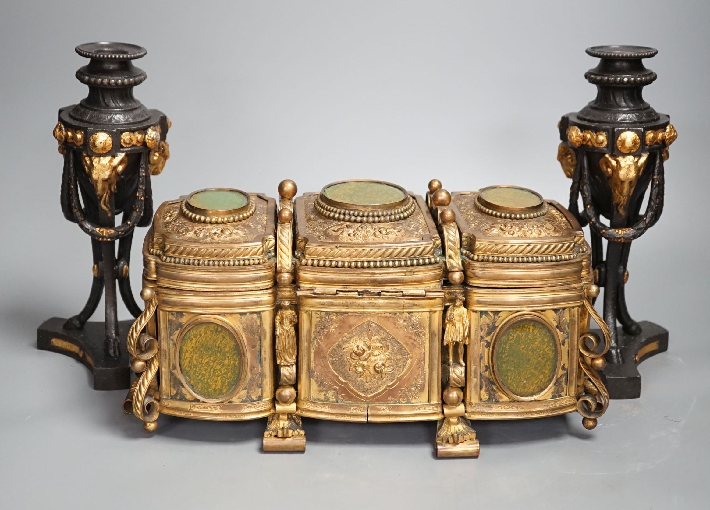 A French gilt metal casket inset with reverse painted glass panels and a pair of ormolu style candlesticks, 22.5cm tall